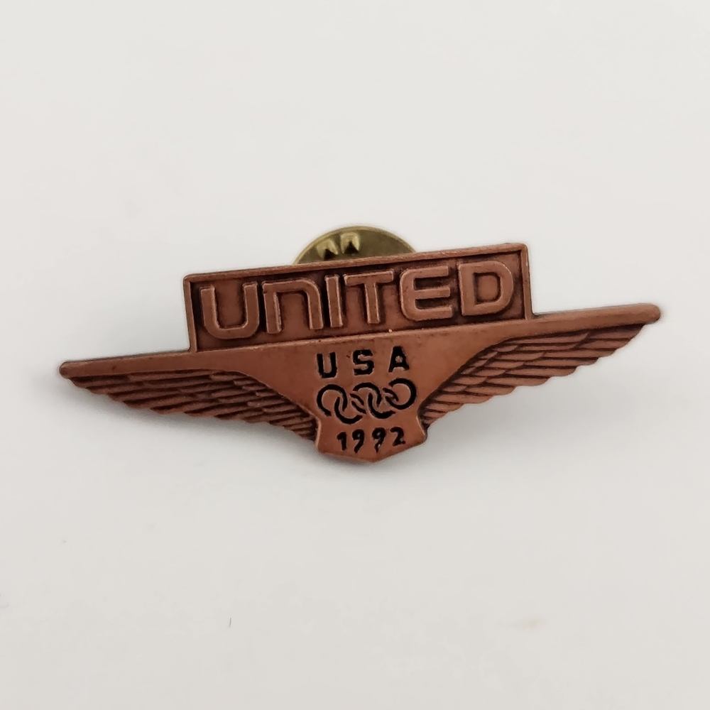 1992 United Airlines USA Olympics metallic, copper-toned pin